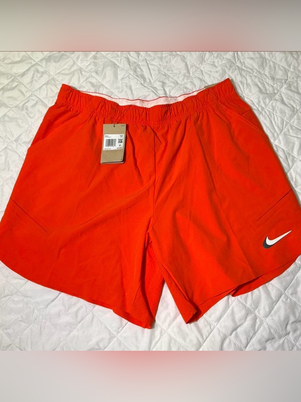 Nike orange running shorts